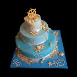 Torta decorata in pasta di zucchero per un compleanno a tema marino
