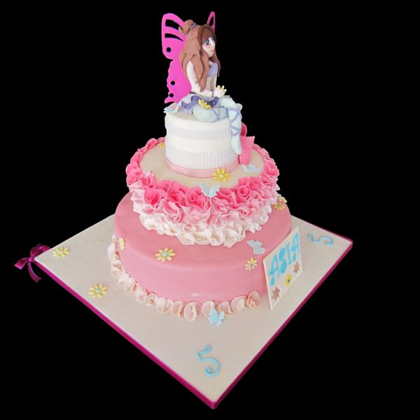 Torta decorata in pasta di zucchero per un compleanno a tema Winx