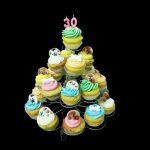 Composizione di muffins con decorazioni in pasta di zucchero a tema Amici a quattro zampe